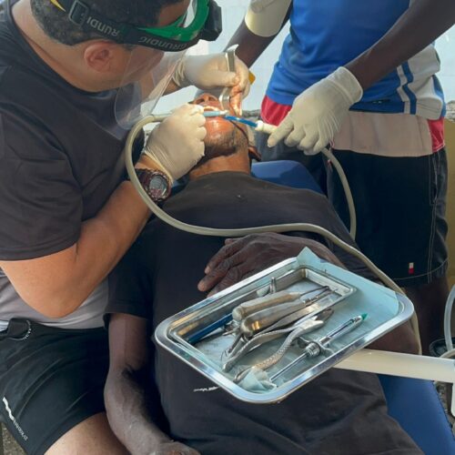 Civil Diplomat Helessandro Oliveira during a humanitarian dental care mission in São Tomé and Príncipe.