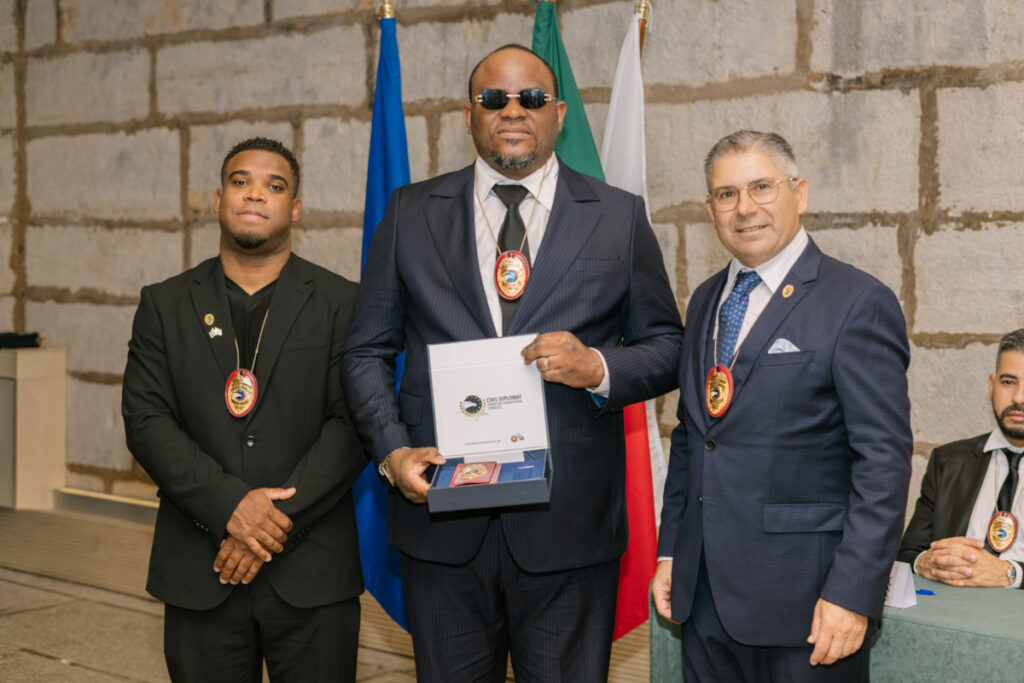 Bethy Pitilo Mwanzita receives the Civil Diplomat credentials from Jethro International.